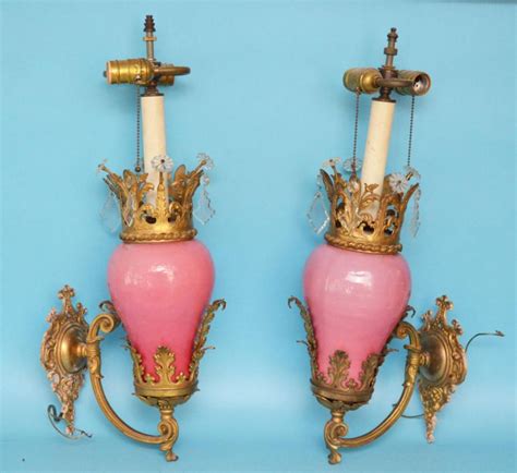 Sold Price: Pr Bronze, Crystal & Pink Pottery Wall Sconces - January 4, 0119 6:00 PM EST