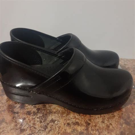 Dansko Women's Clogs | Depop