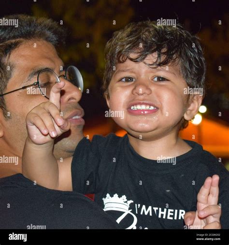 Family enjoying at Malacca River in Malacca, Malaysia during evening time, a popular nightlife ...