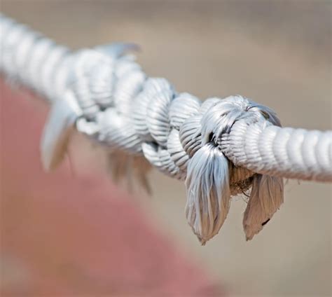 Premium Photo | Detail of a white rope with knot