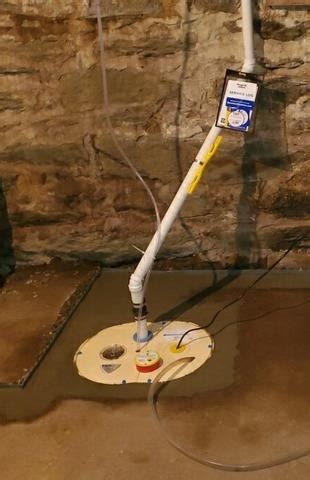 DryZone Basement Systems Before & After Photo Set - TripleSafe Sump Pump Installation In Amherst, MA