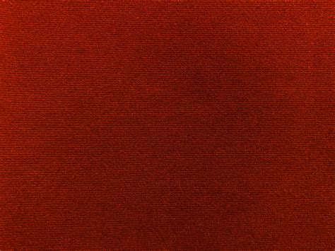 Dark red velvet fabric texture used as background. Empty red fabric ...