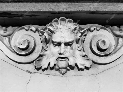 Premium Photo | Decorative detail on the facade relief on the facade of a building stucco ...