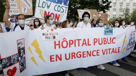 Enough applause: French health workers rally anew for substantive reform