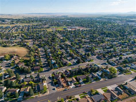 Neighborhood aerial drone picture of cityscape and town with houses and homes from air from ...