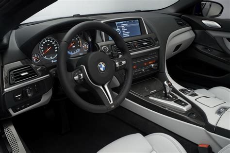 BMW F12. Comparing the interior of the new 6-series to recent BMW interiors, the main difference ...