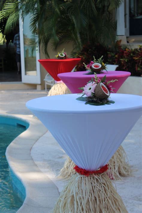 Hawaiian cocktail tables with coconut centerpieces | Luau party decorations, Hawaiian party ...