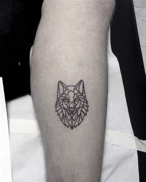 Geometric wolf head tattoo - Tattoogrid.net