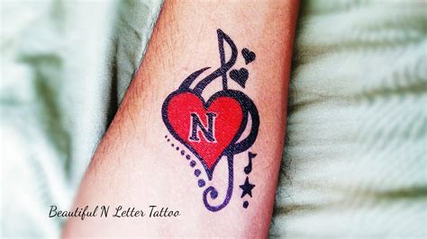 45 Amazing N Letter Tattoo Designs and Ideas - Body Art Guru