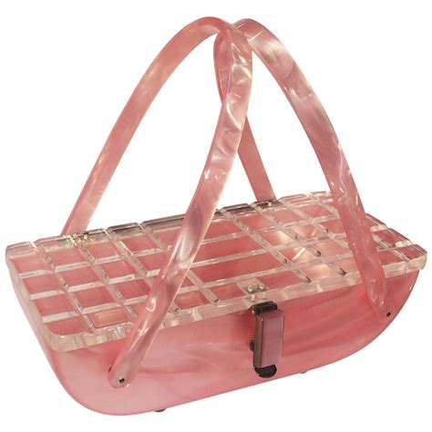 Rare pink marbled lucite purse handbag with carved lid For Sale at 1stdibs