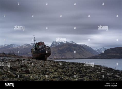 A shipwreck at Corpach, near Fort William with Ben Nevis in the Stock Photo, Royalty Free Image ...