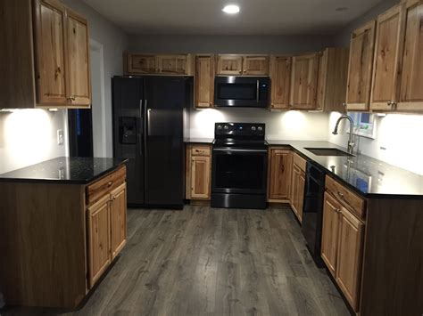 Hickory Cabinets with Black Stainless Appliances