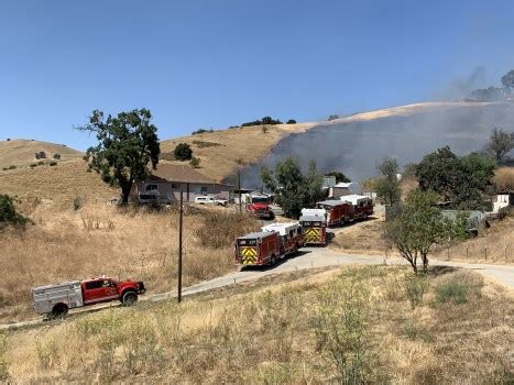 Crews combat San Jose hills grass fire burning near structures