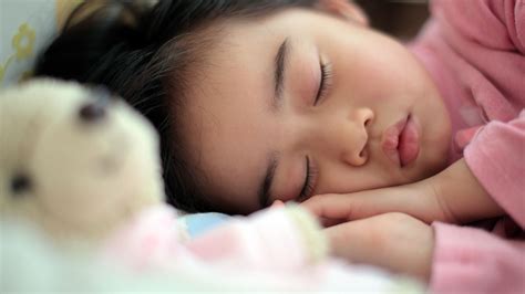 When A Child Grinds Teeth During Sleep - TeethWalls