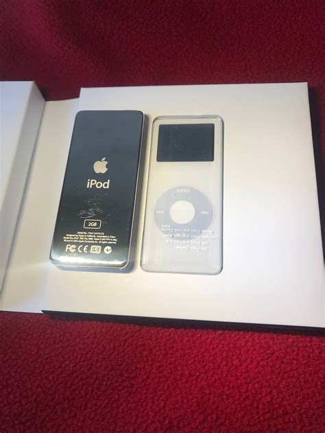 Mint Condition iPod Nano 1st Gen + Sealed Special Edition Nano 1st Gen ...