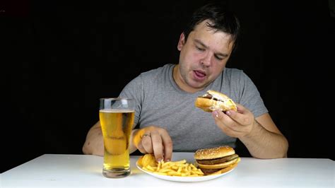 Portrait Of Greedy Fat Man Eating Burger On Stock Footage SBV-316206584 - Storyblocks