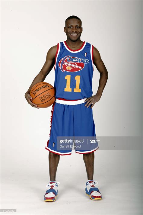 https://media.gettyimages.com/photos/earl-boykins-of-the-denver-nuggets-models-a-throwback ...