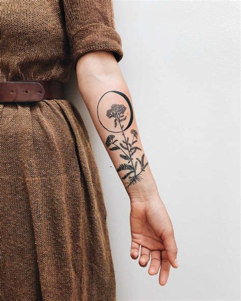 Yarrow and the Waning Gibbous moon tattoo - Tattoogrid.net