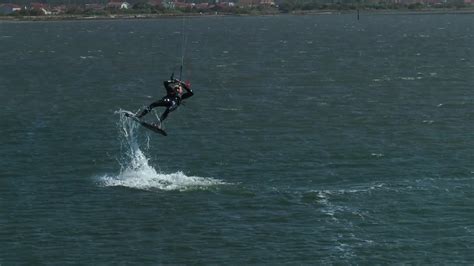 Kitesurfing Technique - Board Behind Front Loop Waterstart Slow Mo - YouTube