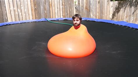 A man fully inside a 6ft water balloon | The Slow Mo Guys | Know Your Meme