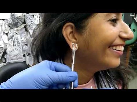 Tattoo Shop Ear Piercing Video