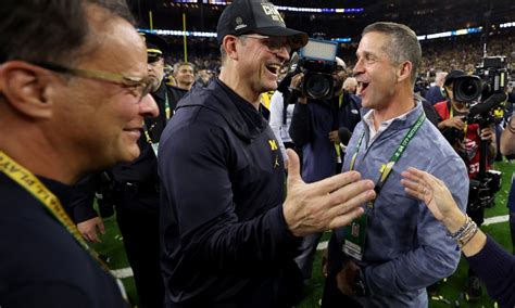 Jim Harbaugh greeted John before the Ravens played the Texans