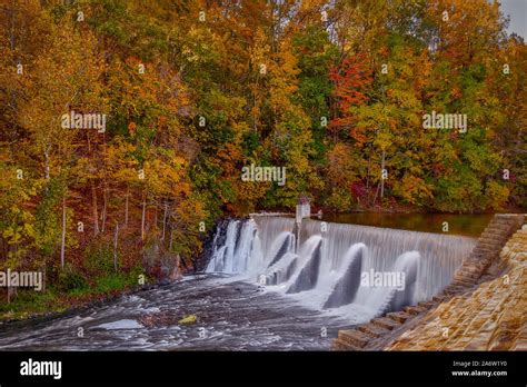 Lake Solitude Dam and Waterfall Stock Photo - Alamy