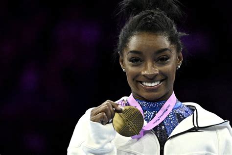 Simone Biles wins history-making 21st world title with all-around ...