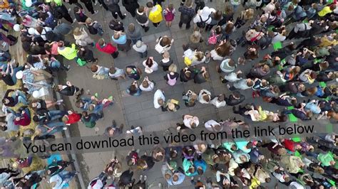 People crowd on city concert, aerial view - YouTube