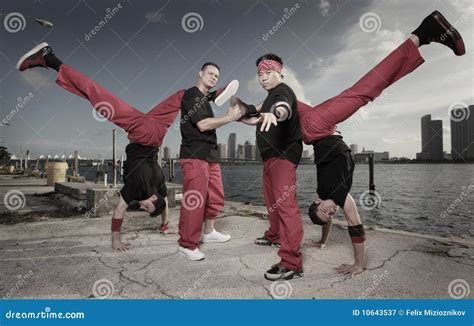 Group of Guys Performing Acrobatic Stunts Stock Image - Image of ...