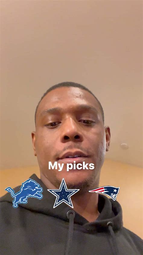 Download Jamahal Hill Picks In Football Teams Wallpaper | Wallpapers.com