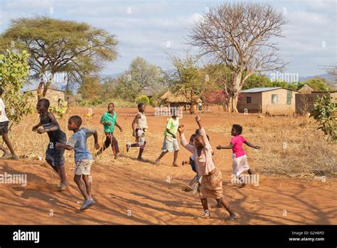 African children playing at the Chiawa Cultural Village on the Zambezi River in Zambia, Africa ...