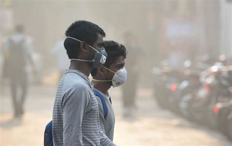 5 million masks distributed as 'toxic' smog descends on Delhi during ...