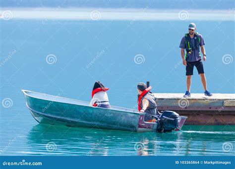 Boat Tourists in Minnewanka Lake Editorial Stock Image - Image of ...