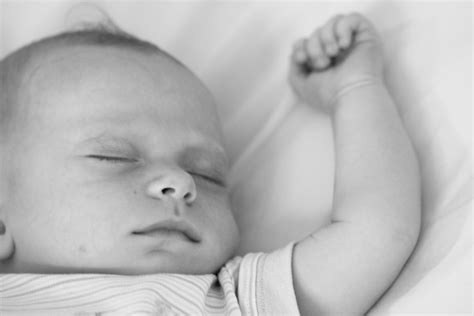 File:Sleeping baby with arm extended.jpg - Wikimedia Commons