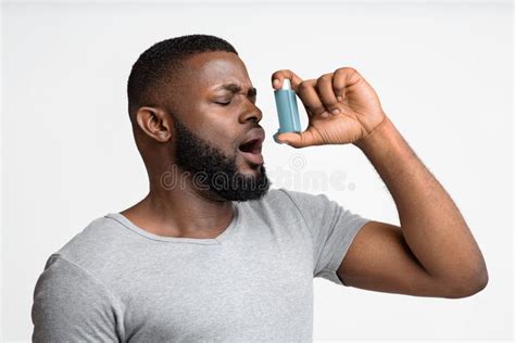 Picture of a Young Man Having an Asthma Attack Stock Photo - Image of ...