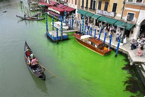 Venice police investigating after famed Grand Canal turns bright green