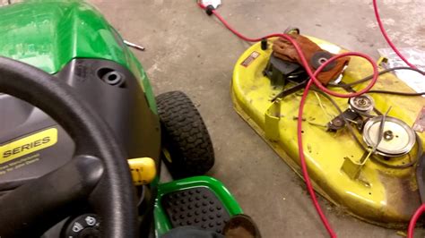 John Deere LA105 engine swap done.. 2nd start and drive - YouTube