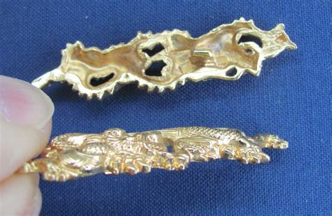 Q731. Gilt Dragon Menuki - Japanese sword books and tsuba