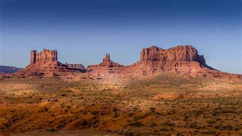 The Towering Sandstone Mitten Buttes and Mesas of the Navajo Nation`s Monument Valley Stock ...