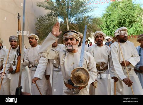 Traditional Omani sword dance in Nizwa fort, Oman Stock Photo - Alamy