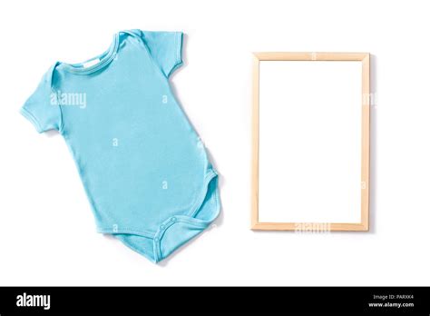 Blue baby romper and frame mockup isolated on white background Stock Photo - Alamy