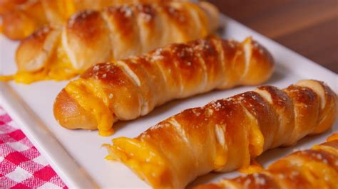 These Easy Cheese-Stuffed Pretzels Are Game-Day Magic | Biscuit recipes dinner, Recipe using ...