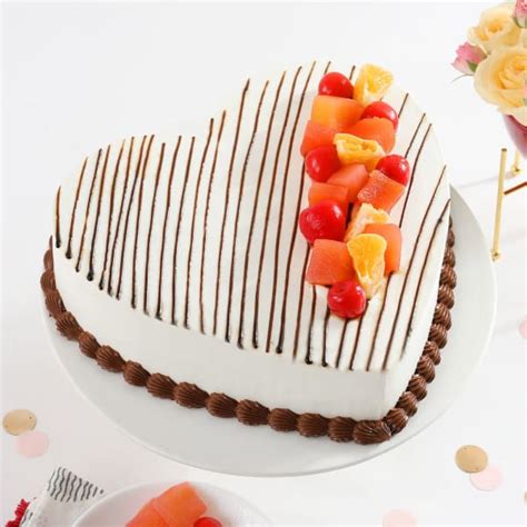 Buy/Send Fresh Fruit Heart shaped Cake 600 gm Online | IGP | JVS1201979