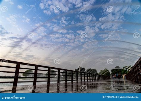 Bridge with Fountain in the Aspire Park during Dramatic Sunset in Doha ...