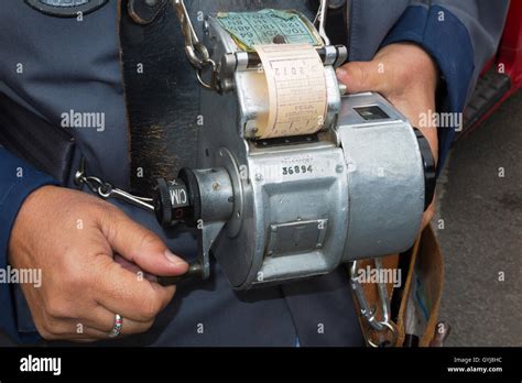 London Transport ticket machine used by bus conductor issuing tickets Stock Photo, Royalty Free ...