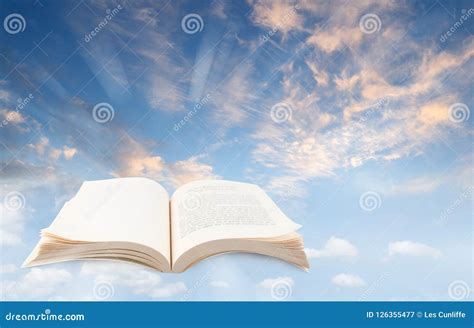 Open book in sky stock image. Image of textbook, light - 126355477