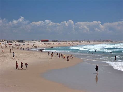 Barra beach - Aveiro with an extensive sandy shore is visited by locals and tourists and is one ...