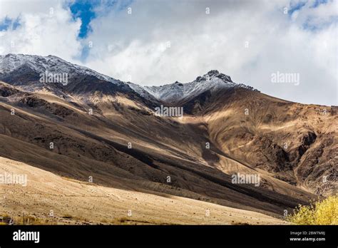 Landscape of snow mountains in Leh Ladakh with cloudy sky Stock Photo ...