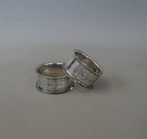 A pair of silver napkin rings